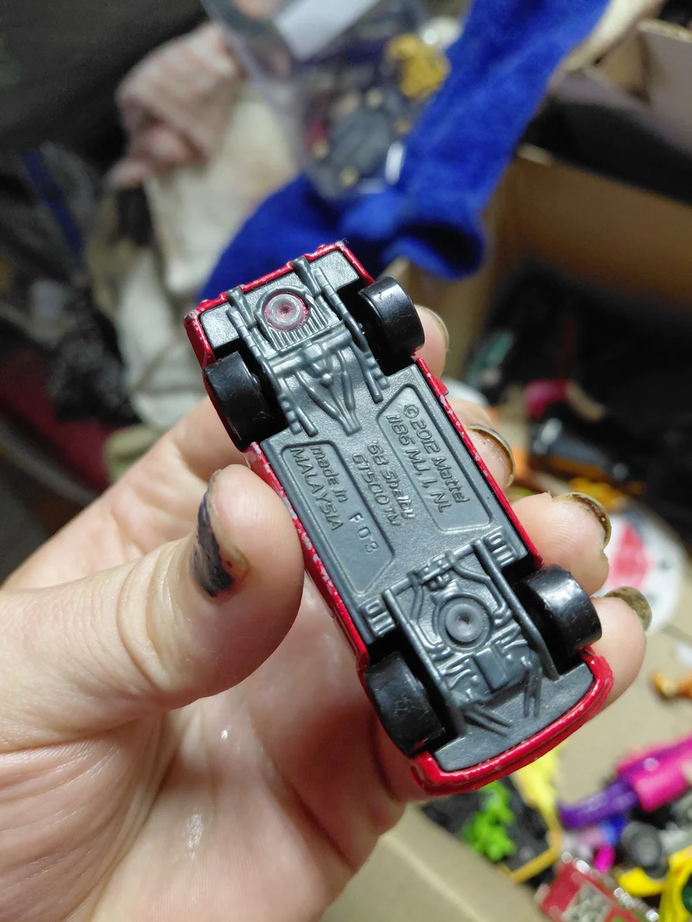 red 1968 Shelby GT500 diecast car by Hot Wheels